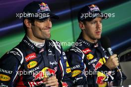 (L to R): Mark Webber (AUS) Red Bull Racing and pole sitter Sebastian Vettel (GER) Red Bull Racing in the FIA Press Conference. 27.10.2012. Formula 1 World Championship, Rd 17, Indian Grand Prix, New Delhi, India, Qualifying Day.