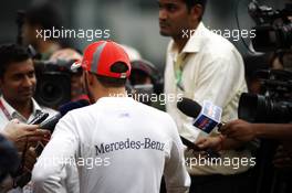 Lewis Hamilton (GBR) McLaren with the media. 27.10.2012. Formula 1 World Championship, Rd 17, Indian Grand Prix, New Delhi, India, Qualifying Day.