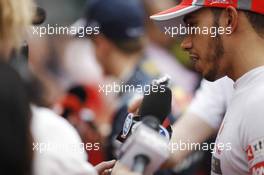 Lewis Hamilton (GBR) McLaren with the media. 27.10.2012. Formula 1 World Championship, Rd 17, Indian Grand Prix, New Delhi, India, Qualifying Day.