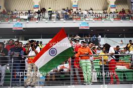Indian fans and flags. 28.10.2012. Formula 1 World Championship, Rd 17, Indian Grand Prix, New Delhi, India, Race Day.