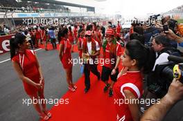 (L to R): Lewis Hamilton (GBR) McLaren with Fernando Alonso (ESP) Ferrari on the drivers parade. 28.10.2012. Formula 1 World Championship, Rd 17, Indian Grand Prix, New Delhi, India, Race Day.