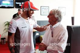 Bernie Ecclestone (GBR) CEO Formula One Group (FOM) celebrates his 82nd birthday with Lewis Hamilton (GBR) McLaren. 28.10.2012. Formula 1 World Championship, Rd 17, Indian Grand Prix, New Delhi, India, Race Day.