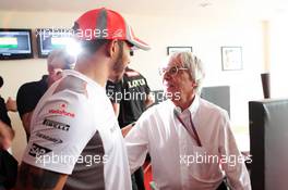 Bernie Ecclestone (GBR) CEO Formula One Group (FOM) celebrates his 82nd birthday with Lewis Hamilton (GBR) McLaren. 28.10.2012. Formula 1 World Championship, Rd 17, Indian Grand Prix, New Delhi, India, Race Day.