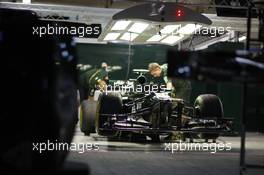 Caterham CT01 in the pit garage at night. 25.10.2012. Formula 1 World Championship, Rd 17, Indian Grand Prix, New Delhi, India, Preparation Day