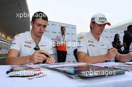 (L to R): Paul di Resta (GBR) Sahara Force India F1 with Nico Hulkenberg (GER) Sahara Force India F1 sign autographs for the fans. 25.10.2012. Formula 1 World Championship, Rd 17, Indian Grand Prix, New Delhi, India, Preparation Day