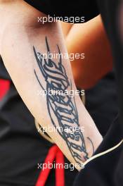 Tattoo on the arm of Kimi Raikkonen (FIN) Lotus F1 Team. 25.10.2012. Formula 1 World Championship, Rd 17, Indian Grand Prix, New Delhi, India, Preparation Day