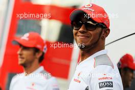 (L to R): Jenson Button (GBR) McLaren with team mate Lewis Hamilton (GBR) McLaren. 07.09.2012. Formula 1 World Championship, Rd 13, Italian Grand Prix, Monza, Italy, Practice Day