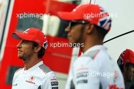 (L to R): Jenson Button (GBR) McLaren with team mate Lewis Hamilton (GBR) McLaren. 07.09.2012. Formula 1 World Championship, Rd 13, Italian Grand Prix, Monza, Italy, Practice Day