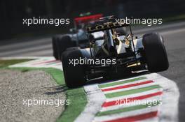 Lewis Hamilton (GBR) McLaren MP4/27 leads Kimi Raikkonen (FIN) Lotus F1 E20. 07.09.2012. Formula 1 World Championship, Rd 13, Italian Grand Prix, Monza, Italy, Practice Day