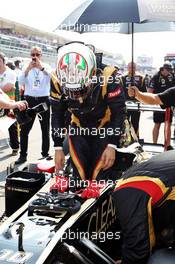 Jerome d'Ambrosio (BEL) Lotus F1 E20 on the grid. 09.09.2012. Formula 1 World Championship, Rd 13, Italian Grand Prix, Monza, Italy, Race Day