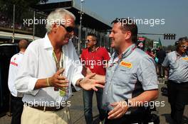 (L to R): Marco Tronchetti Provera (ITA) Pirelli Chairman with Paul Hembery (GBR) Pirelli Motorsport Director on the grid. 09.09.2012. Formula 1 World Championship, Rd 13, Italian Grand Prix, Monza, Italy, Race Day