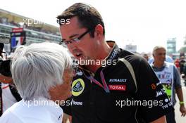 Eric Boullier (FRA) Lotus F1 Team Principal with Bernie Ecclestone (GBR) CEO Formula One Group (FOM) on the grid. 09.09.2012. Formula 1 World Championship, Rd 13, Italian Grand Prix, Monza, Italy, Race Day