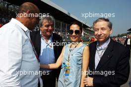 Jean Todt (FRA) FIA President with Michelle Yeoh (MAL) on the grid. 09.09.2012. Formula 1 World Championship, Rd 13, Italian Grand Prix, Monza, Italy, Race Day