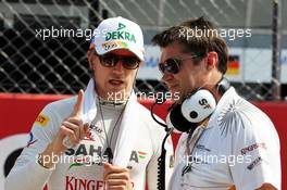 Nico Hulkenberg (GER) Sahara Force India F1 on the grid with Bradley Joyce (GBR) Sahara Force India F1 Race Engineer. 09.09.2012. Formula 1 World Championship, Rd 13, Italian Grand Prix, Monza, Italy, Race Day
