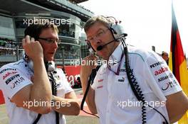(L to R): Andrew Shovlin (GBR) Mercedes AMG F1 Engineer with Ross Brawn (GBR) Mercedes AMG F1 Team Principal on the grid. 09.09.2012. Formula 1 World Championship, Rd 13, Italian Grand Prix, Monza, Italy, Race Day