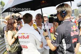 Sebastian Vettel (GER) Red Bull Racing on the grid with Kai Ebel (GER) RTL TV Presenter. 09.09.2012. Formula 1 World Championship, Rd 13, Italian Grand Prix, Monza, Italy, Race Day