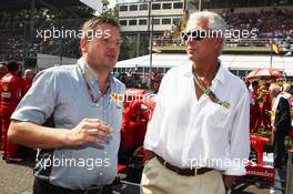 (L to R): Paul Hembery (GBR) Pirelli Motorsport Director with Marco Tronchetti Provera (ITA) Pirelli Chairman on the grid. 09.09.2012. Formula 1 World Championship, Rd 13, Italian Grand Prix, Monza, Italy, Race Day