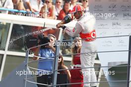 Race winner Lewis Hamilton (GBR) McLaren celebrates on the podium. 09.09.2012. Formula 1 World Championship, Rd 13, Italian Grand Prix, Monza, Italy, Race Day