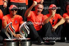 (L to R): Lewis Hamilton (GBR) McLaren celebrates with Martin Whitmarsh (GBR) McLaren Chief Executive Officer, Jenson Button (GBR) McLaren and the team. 09.09.2012. Formula 1 World Championship, Rd 13, Italian Grand Prix, Monza, Italy, Race Day