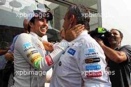 (L to R): Sergio Perez (MEX) Sauber celebrates his second position with Beat Zehnder (SUI) Sauber F1 Team Manager. 09.09.2012. Formula 1 World Championship, Rd 13, Italian Grand Prix, Monza, Italy, Race Day
