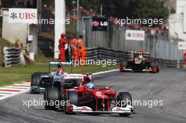 Fernando Alonso (ESP) Ferrari F2012 leads Michael Schumacher (GER) Mercedes AMG F1 W03. 09.09.2012. Formula 1 World Championship, Rd 13, Italian Grand Prix, Monza, Italy, Race Day