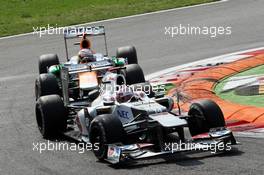 Kamui Kobayashi (JPN) Sauber C31 leads Paul di Resta (GBR) Sahara Force India VJM05. 09.09.2012. Formula 1 World Championship, Rd 13, Italian Grand Prix, Monza, Italy, Race Day