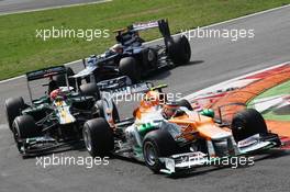 Nico Hulkenberg (GER) Sahara Force India F1 VJM05 leads Heikki Kovalainen (FIN) Caterham CT01. 09.09.2012. Formula 1 World Championship, Rd 13, Italian Grand Prix, Monza, Italy, Race Day