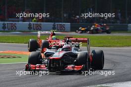 Jenson Button (GBR) McLaren MP4/27 leads Felipe Massa (BRA) Ferrari F2012. 09.09.2012. Formula 1 World Championship, Rd 13, Italian Grand Prix, Monza, Italy, Race Day