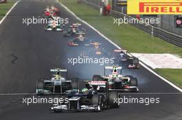 Bruno Senna (BRA) Williams FW34 leads Nico Rosberg (GER) Mercedes AMG F1 W03 and Sergio Perez (MEX) Sauber C31. 09.09.2012. Formula 1 World Championship, Rd 13, Italian Grand Prix, Monza, Italy, Race Day