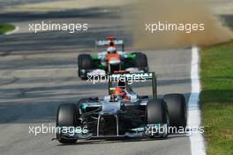 Michael Schumacher (GER) Mercedes AMG F1 W03 leads Paul di Resta (GBR) Sahara Force India VJM05. 09.09.2012. Formula 1 World Championship, Rd 13, Italian Grand Prix, Monza, Italy, Race Day