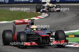 Race winner Lewis Hamilton (GBR) McLaren MP4/27 leads second placed Sergio Perez (MEX) Sauber C31. 09.09.2012. Formula 1 World Championship, Rd 13, Italian Grand Prix, Monza, Italy, Race Day