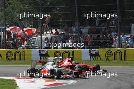 Lewis Hamilton (GBR) McLaren MP4/27 leads Felipe Massa (BRA) Ferrari F2012 at the start of the race. 09.09.2012. Formula 1 World Championship, Rd 13, Italian Grand Prix, Monza, Italy, Race Day