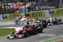 Fernando Alonso (ESP) Ferrari F2012 leads Kimi Raikkonen (FIN) Lotus F1 E20; Kamui Kobayashi (JPN) Sauber C31 and Paul di Resta (GBR) Sahara Force India VJM05. 09.09.2012. Formula 1 World Championship, Rd 13, Italian Grand Prix, Monza, Italy, Race Day