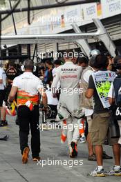 Paul di Resta (GBR) Sahara Force India F1 and Gerry Convy (GBR) Personal Trainer of Paul di Resta (GBR) Sahara Force India F1  walk through the pits. 08.09.2012. Formula 1 World Championship, Rd 13, Italian Grand Prix, Monza, Italy, Qualifying Day