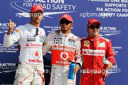 Qualifying parc ferme top 3 (L to R): Jenson Button (GBR) McLaren, second; Lewis Hamilton (GBR) McLaren, pole position; Sebastian Vettel (GER) Red Bull Racing, third. 08.09.2012. Formula 1 World Championship, Rd 13, Italian Grand Prix, Monza, Italy, Qualifying Day