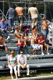 (L to R): Lynden Swainston (GBR) LSA and Nick Warren (GBR) Travel Places in the front row of the grandstand. 08.09.2012. Formula 1 World Championship, Rd 13, Italian Grand Prix, Monza, Italy, Qualifying Day