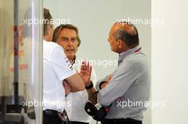 (L to R): Mansour Ojjeh, McLaren shareholder with Ron Dennis (GBR) McLaren Executive Chairman and Luca di Montezemolo (ITA) Ferrari President in the McLaren pits. 08.09.2012. Formula 1 World Championship, Rd 13, Italian Grand Prix, Monza, Italy, Qualifying Day