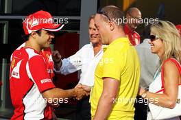 Benjamin Sloss Treynor (USA) Vice-President Google Management Group is presented with a Ferrari 512 he won in an auction to raise funds for victims of the Italian earthquake by Luca di Montezemolo (ITA) Ferrari President; Felipe Massa (BRA) Ferrari and Fernando Alonso (ESP) Ferrari. 08.09.2012. Formula 1 World Championship, Rd 13, Italian Grand Prix, Monza, Italy, Qualifying Day