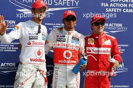 Qualifying parc ferme top 3 (L to R): Jenson Button (GBR) McLaren, second; Lewis Hamilton (GBR) McLaren, pole position; Sebastian Vettel (GER) Red Bull Racing, third. 08.09.2012. Formula 1 World Championship, Rd 13, Italian Grand Prix, Monza, Italy, Qualifying Day