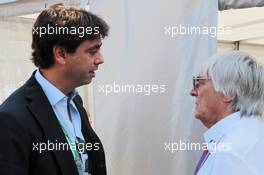 (L to R): Andrea Agnelli (ITA) FIAT and Exor Board Member and President of Juventus FC with Bernie Ecclestone (GBR) CEO Formula One Group (FOM). 09.09.2012. Formula 1 World Championship, Rd 13, Italian Grand Prix, Monza, Italy, Race Day