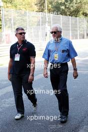 Charlie Whiting (GBR) FIA Delegate (Right) walks the circuit. 06.09.2012. Formula 1 World Championship, Rd 13, Italian Grand Prix, Monza, Italy, Preparation Day