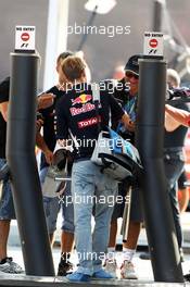 Sebastian Vettel (GER) Red Bull Racing signs autographs for the fans. 06.09.2012. Formula 1 World Championship, Rd 13, Italian Grand Prix, Monza, Italy, Preparation Day