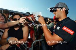 Daniel Ricciardo (AUS) Scuderia Toro Rosso signs autographs for the fans. 06.09.2012. Formula 1 World Championship, Rd 13, Italian Grand Prix, Monza, Italy, Preparation Day