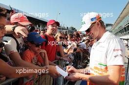 Nico Hulkenberg (GER) Sahara Force India F1 signs autographs for the fans. 06.09.2012. Formula 1 World Championship, Rd 13, Italian Grand Prix, Monza, Italy, Preparation Day