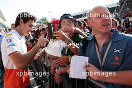 Jules Bianchi (FRA) Sahara Force India F1 Team Third Driver signs autographs for the fans. 06.09.2012. Formula 1 World Championship, Rd 13, Italian Grand Prix, Monza, Italy, Preparation Day