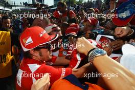 Fernando Alonso (ESP) Ferrari signs autographs for the fans. 06.09.2012. Formula 1 World Championship, Rd 13, Italian Grand Prix, Monza, Italy, Preparation Day