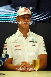 Michael Schumacher (GER) Mercedes AMG F1 at the tie-in with an GPS navigation company Erlinyou. 06.09.2012. Formula 1 World Championship, Rd 13, Italian Grand Prix, Monza, Italy, Preparation Day