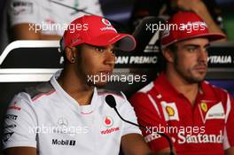 (L to R): Lewis Hamilton (GBR) McLaren and Fernando Alonso (ESP) Ferrari in the FIA Press Conference. 06.09.2012. Formula 1 World Championship, Rd 13, Italian Grand Prix, Monza, Italy, Preparation Day