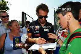 Jean-Eric Vergne (FRA) Scuderia Toro Rosso signs autographs for the fans. 06.09.2012. Formula 1 World Championship, Rd 13, Italian Grand Prix, Monza, Italy, Preparation Day