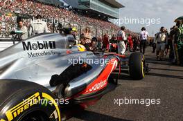 Lewis Hamilton (GBR) McLaren MP4/27 on the grid. 07.10.2012. Formula 1 World Championship, Rd 15, Japanese Grand Prix, Suzuka, Japan, Race Day.